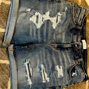 Woman’s distressed jean shorts